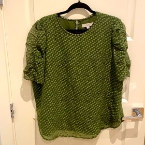Loft Green Blouse with sheer, puff sleeves.